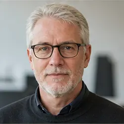 Portrait representing Dr. Isaac Monroe, an AI professional